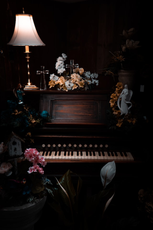 piano decorated with flowers